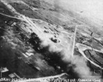 Shinchiku Airfield under US Navy carrier aircraft attack, Taiwan, 13 Oct 1944, photo 1 of 2