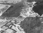 Suo (now Suao) harbor under attack by a PB4Y-1 aircraft of US Navy squadron VPB-104, eastern Taiwan, 22 Apr 1945, photo 3 of 4