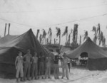 Enlisted men of the USMC Assistant Division Commander at Peleliu, Palau Islands, 1944; note three African-American messmen