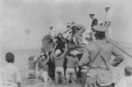 US Marines unloading a motorcycle from a boat, US Territory of Hawaii, circa 1943