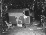 US Marine Corps Sergeant William Swisher and another Marine at a makeshift photography dark room, Guam, 1944