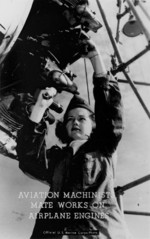 Female US Marine working on an aircraft engine, circa 1943
