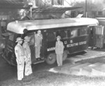 Governor of New York Herbert Lehman inspecting a US Marine Corps recruitment service trailer, New York State Executive Mansion, Albany, New York, United States, circa 1942; Marine Major Frank V. McKinless at right