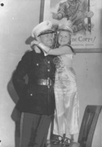 US Marine Major Frank V. McKinless with honorary sergeant of his recruiting staff 5-year-old Jacqueline Simone Rudolph, United States, circa 1945