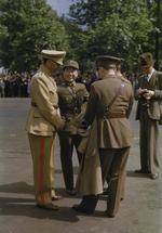 An Iranian, a Chinese, and two British officers in conversation during the United Nations Day Parade, London, England, United Kingdom, 14 Jun 1943