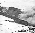 The prison at Amiens, France under RAF, RNZAF, RAAF attack with Mosquito bombers during Operation Jericho, 18 Feb 1944