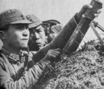 Chinese soldiers of the Japanese-sponsored Nanjing puppet government with a mortar, China, date unknown