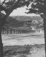 Men of US 2nd Marine Regiment marching near Camp McKay, New Zealand, 1943