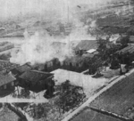 Civilian homes being bombed by B-25 bombers of USAAF 405th Bombardment Squadron B-25, Kagi, Taiwan, 3 Apr 1945