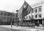 Raising the Chinese flag at the Chinese occupation headquarters in Osaka, Japan, 8 Sep 1945