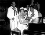 African-American pianist Dorothy Donegan playing with the Camp Robert Smalls swing band at US Navy Naval Training Station, Great Lakes, Illinois, United States, 16 Jun 1943
