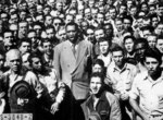 African-American baritone singer Paul Robeson leading the song 