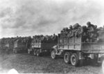 Japanese-American troops of US 442nd Regimental Combat Team advancing in trucks, Chambois Sector, France, circa late 1944