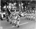 Japanese-American troops of US 442nd Regimental Combat Team marching in the Veterans Day Parade at Kapiolani Park, Honolulu, US Territory of Hawaii, 15 Aug 1946, photo 1 of 2