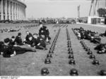 German SS men resting on the south lawn of the Olympic Stadium in Berlin, Germany, Aug 1936