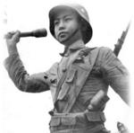Soldier of the Chinese 88th Division posing with Zhongzheng Type rifle and Model 24 Stielhandgranate grenade