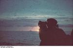 Silhouette of a German military personnel aboard a ship off Tunis, Tunisia, circa Mar 1943, photo 1 of 2