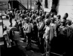 African-American US Marines aboard a US Coast Guard-manned transport in the Pacific Ocean, circa Feb 1944