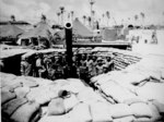 African-American crew of US Marine Corps 51st Defense Battalion posed with their artillery 