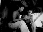 Two African-American US Marine Corps movie operators, somewhere in the Pacific Theater, Jan 1945