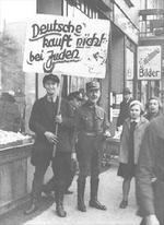 Nazi Party members boycotting a Jewish-owned store in Hamburg, Germany, 1 Apr 1933