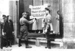 German Nazi SA men posting a boycott notice on a Jewish-owned store, Berlin, Germany, 1 Apr 1933
