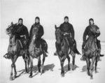 African-American men of USCG Horse Patrol Unit atop their steeds in New Jersey, United States, date unknown; left to right: Seamen 1st Class C. Johnson, Jesse Willis, Joseph Washington, Frank Garcia