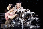 An American woman being trained as an aircraft engine mechanic at the Douglas Aircraft Company in Long Beach, California, United States, Oct 1942