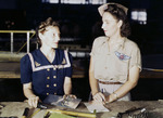 Pearl Harbor widow Virginia Young supervising trainee Ethel Mann at the Assembly and Repairs Department of Naval Air Station Corpus Christi, Texas, United States, Aug 1942
