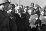 Actress Lyubov Orlova with soldiers at the Baladzhary railroad station in Baku, Azerbaijan, 1 Apr 1943