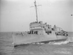 HMS Leamington preparing to receive a mail bag from HMS Mauritius, 1940s