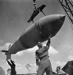 Hoisting a Tallboy bomb, RAF Woodhall Spa, Lincolnshire, England, United Kingdom, 1942-1945