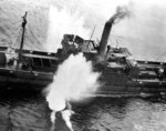 Japanese freighter under air attack by two PB4Y Privateer patrol aircraft of US Navy Fleet Air Wing One, 30 miles north of Busan, Korea, Jul 1945