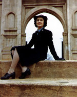 WAVES Yeoman 3rd Class Ellen Figg posing by the entrance to the Old Capitol Grounds, Milledgeville, Georgia, United States, circa Sep 1944