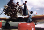 WAVES aircraft mechanics working on a SNJ aircraft, Naval Auxiliary Air Station, Whiting Field, Pensacola, Florida, United States, circa 1943-1945; note Pratt & Whitney R-1340 Wasp radial engine