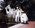 US Navy personnel Anna Welsh, Jackie Welsh, Evalyne Olsen, and Harold Howey, Naval Air Station, New Orleans, Louisiana, United States, circa 1944