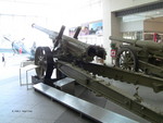 Type 89 15-cm cannon on display at Yushukan Museum, Tokyo, Japan, 7 Sep 2009, photo 2 of 3; note Type 96 15-cm howitzer, A6M Zero Model 52 fighter in background