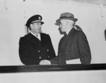 Admiral Robert Dennison and General Omar Bradley aboard US President Harry Truman