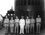 Captain Arleigh Burke (third from right) aboard SS President Monroe en route to the South Pacific, 1943