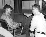 Vice Admiral Mitscher and Commodore Burke aboard carrier Randolph off Okinawa, Japan, 1945, photo 2 of 2