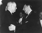 Burke speaking to MacArthur at MacArthur