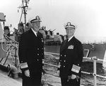 Vice Admiral Clarence E. Ekstrom and Admiral Arleigh A. Burke aboard cruiser Des Moines in the Mediterranean Sea, May 1959