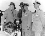 US President Dwight Eisenhower, Secretary of the Navy Thomas Gates, Jr., Admiral Arleigh Burke, and Admiral Jerauld Wright aboard USS Saratoga, 6 Jun 1957