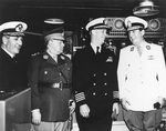 Argentine Navy Minister Admiral Garcia, Argentine Minister of War, US Navy Captain Arleigh Burke, and Argentine President Juan Peron aboard USS Huntington, Buenos Aires, Argentina, Nov 1948