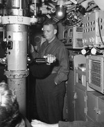 Rear Admiral Burke aboard a submarine in the early 1950s