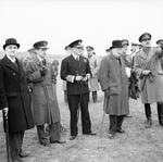 Lord Cherwell, Charles Portal, Dudley Pound, Winston Churchill, and others observing anti-aircraft gunnery in Britain, Jun 1941