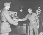 Generalleutnant Fridolin von Senger und Etterlin surrendering to General Mark Clark at US 15th Army Group Headquarters, Italy, 4 May 1945
