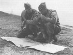 Mark Clark and Geoffrey Keyes studying a map in the field, Italy, 1943-1945