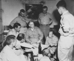 William Donovan in a clandestine meeting with field agents and officers, Xi