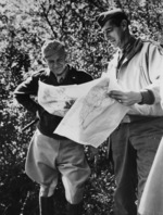 General Dwight Eisenhower and Lieutenant General Mark Clark studying maps of the Mignano Gap, north of Naples, Italy, 22 Oct 1943